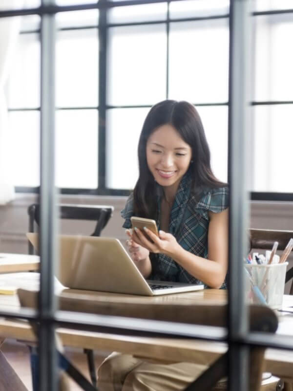 Young woman authenticating her identity online