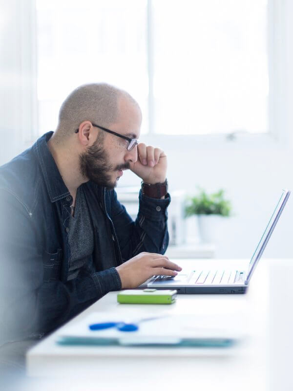 Man evaluating data in the office