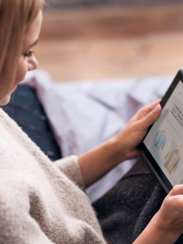 Woman making purchases on her tablet