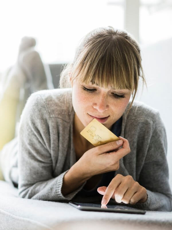 Woman paying for items online