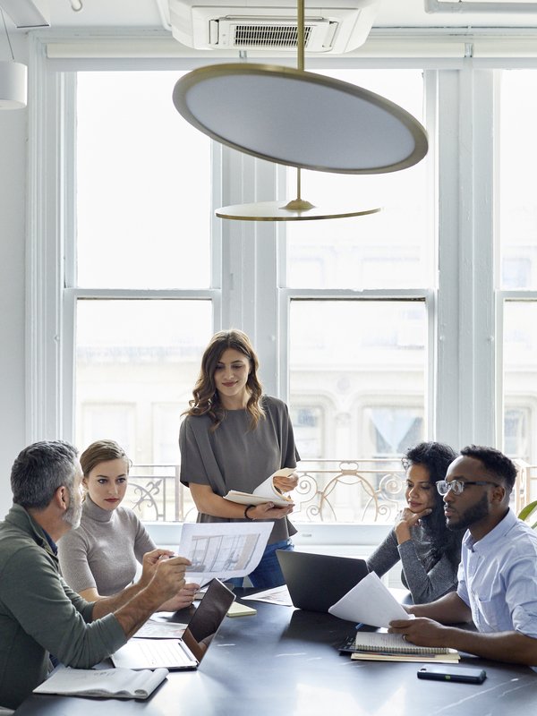 Work colleagues discussing commercial lending