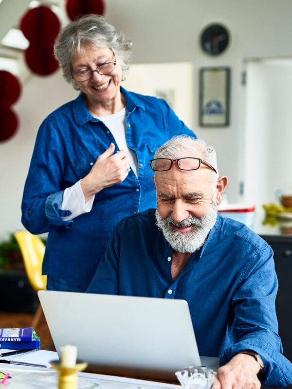 Mature couple taking advantage of a more personalised credit offering
