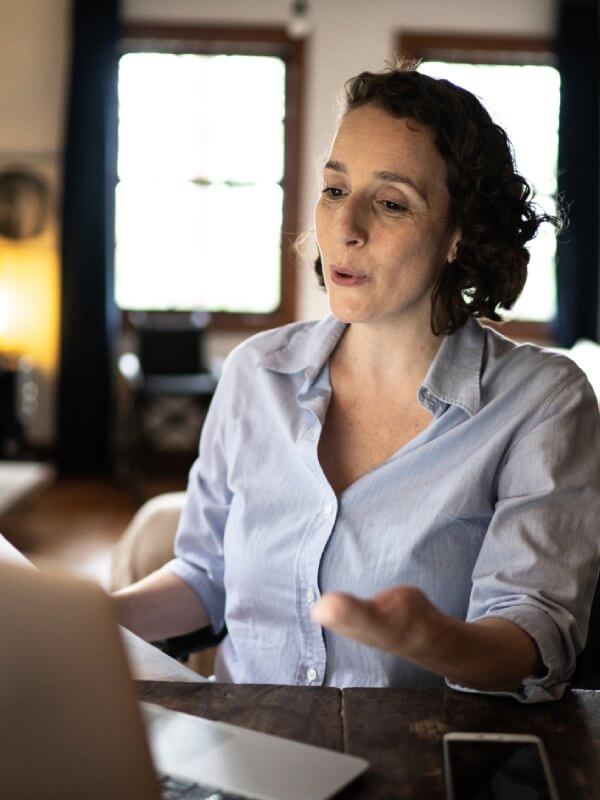 Woman talking in an online team meeting