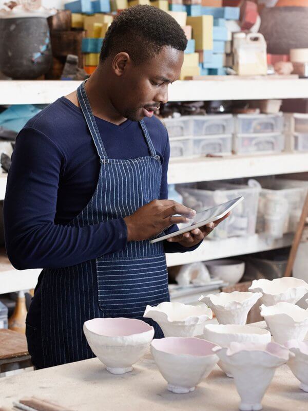 Small business owner organising orders