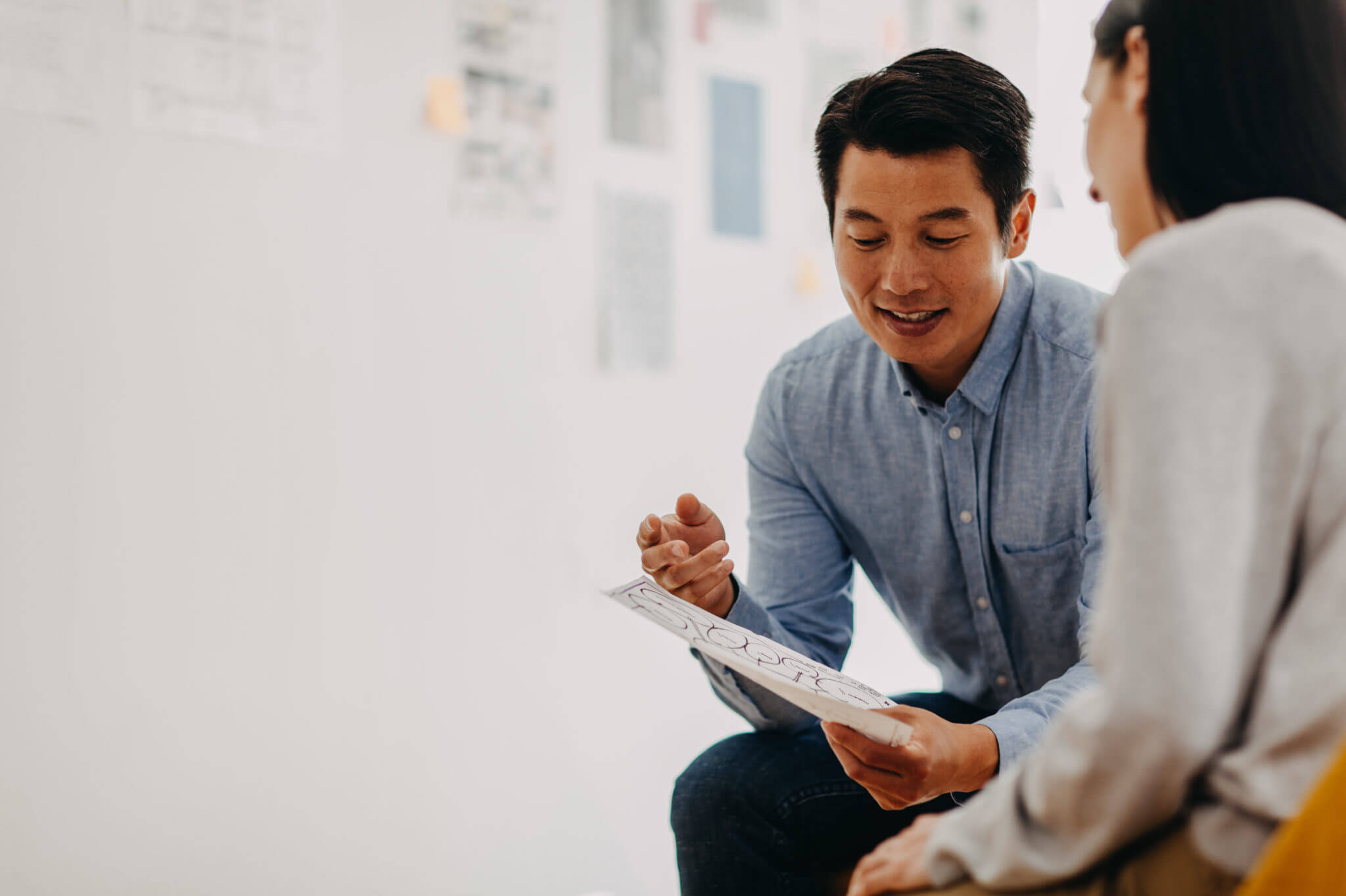 Businessman sharing data with a colleague