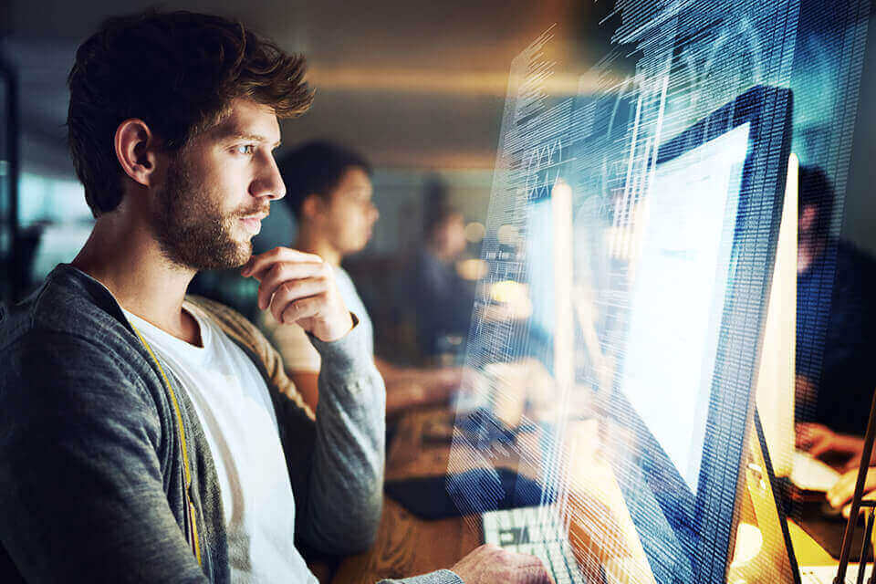 Office worker assessing his customer's credit data